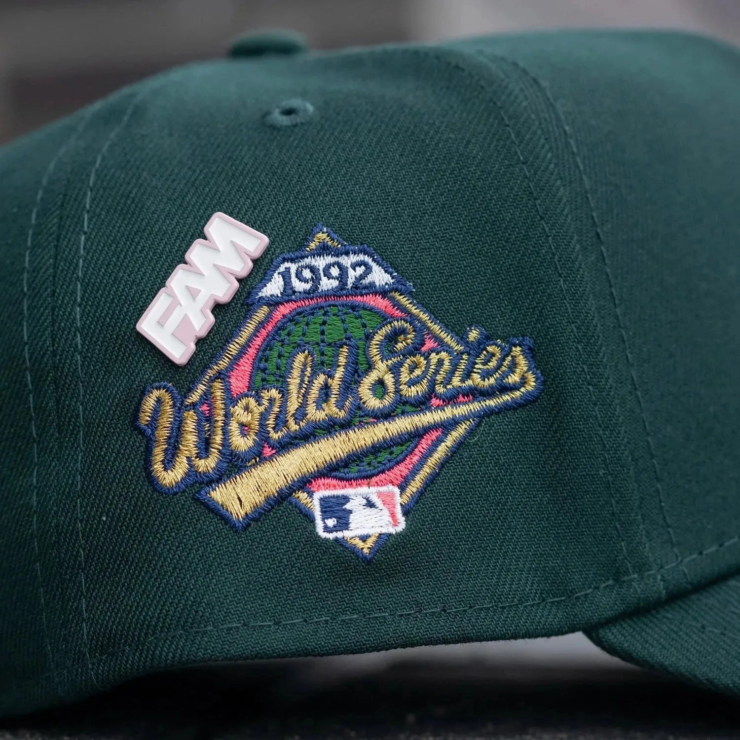 NEW ERA 9FORTY A-FRAME MLB TORONTO BLUE JAYS WORLD SERIES 1992 DARK GREEN / PINK UV SNAPBACK CAP