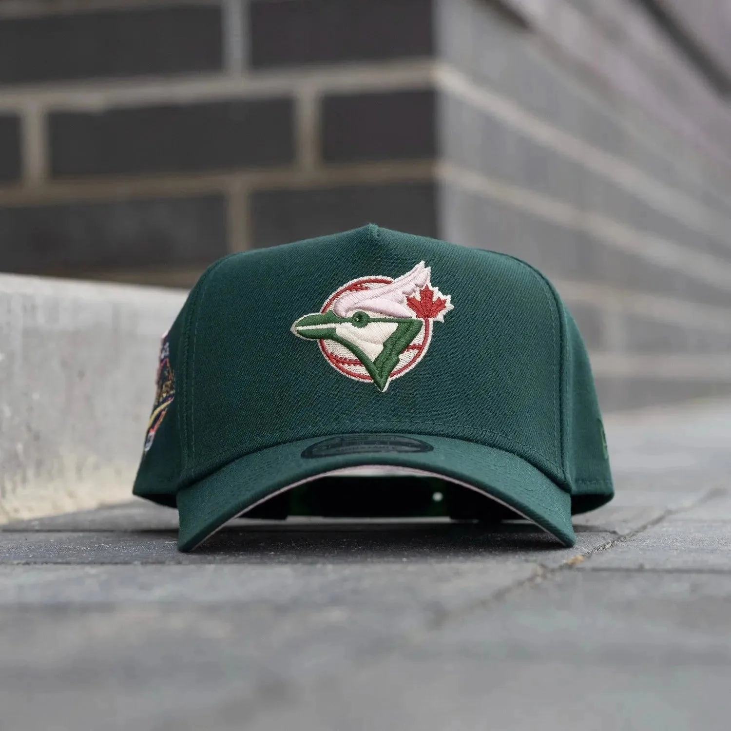 NEW ERA 9FORTY A-FRAME MLB TORONTO BLUE JAYS WORLD SERIES 1992 DARK GREEN / PINK UV SNAPBACK CAP