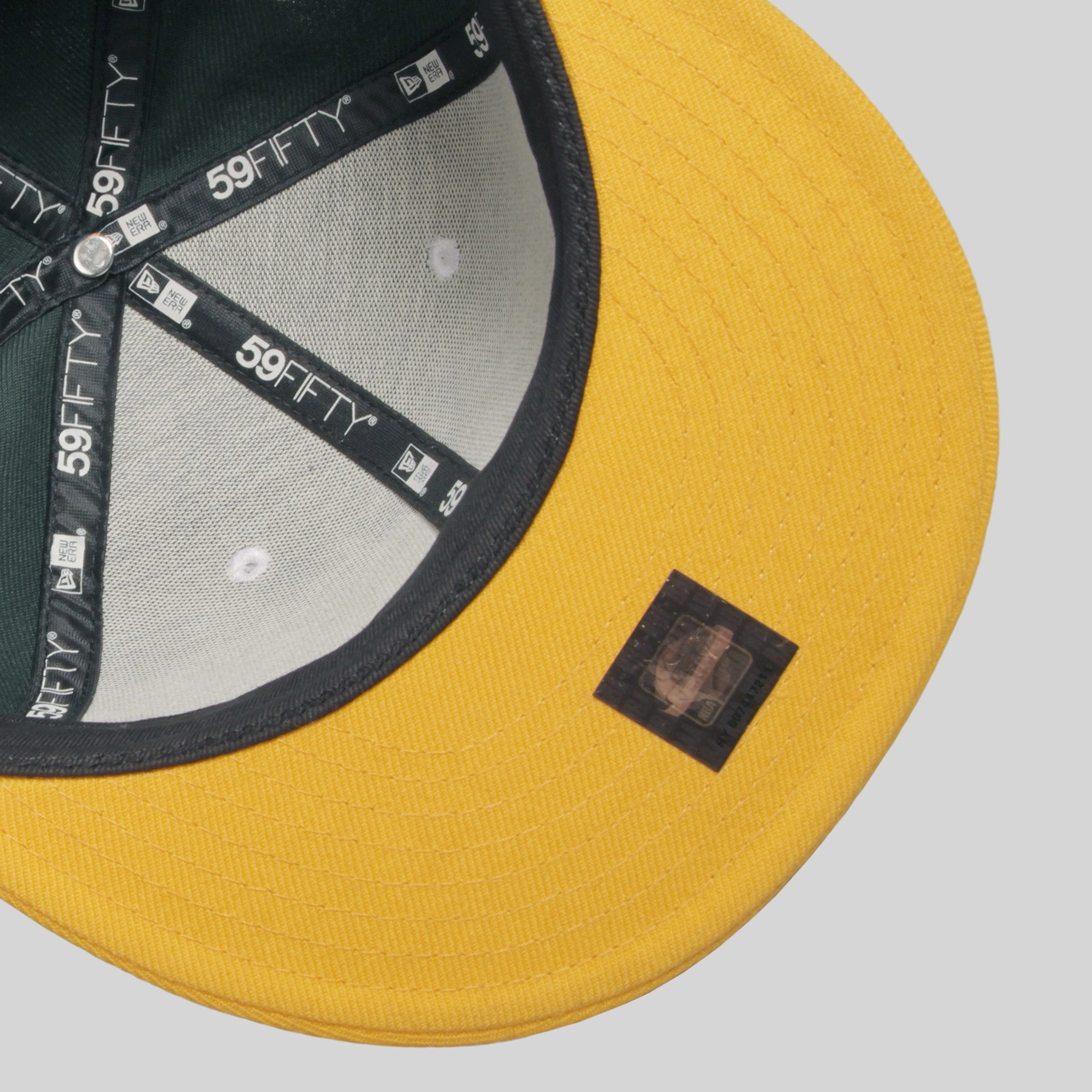 THE CITY New Era Fitted Cap in Green/Gold