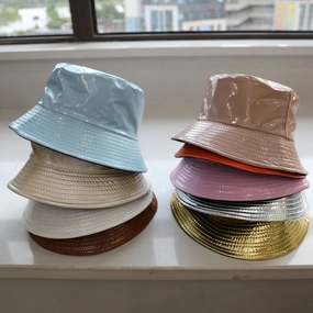 Wholesale of Solid Color Patent Leather with Polyester Fisherman Hats on Both Sides