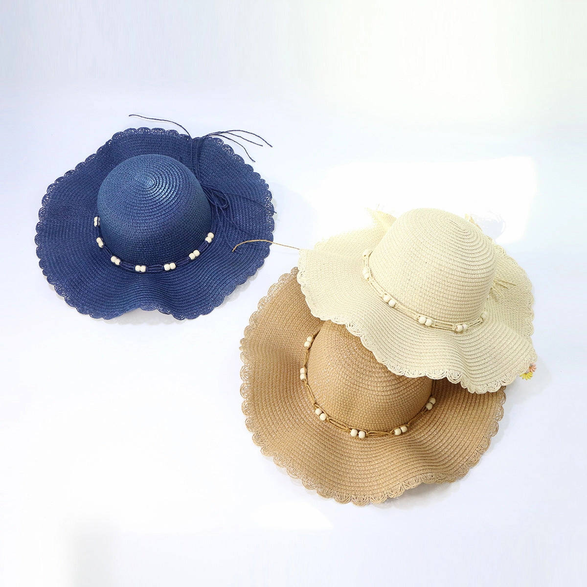 Wholesale Wide Brim Wood Bead Lace Wavy Straw Hat